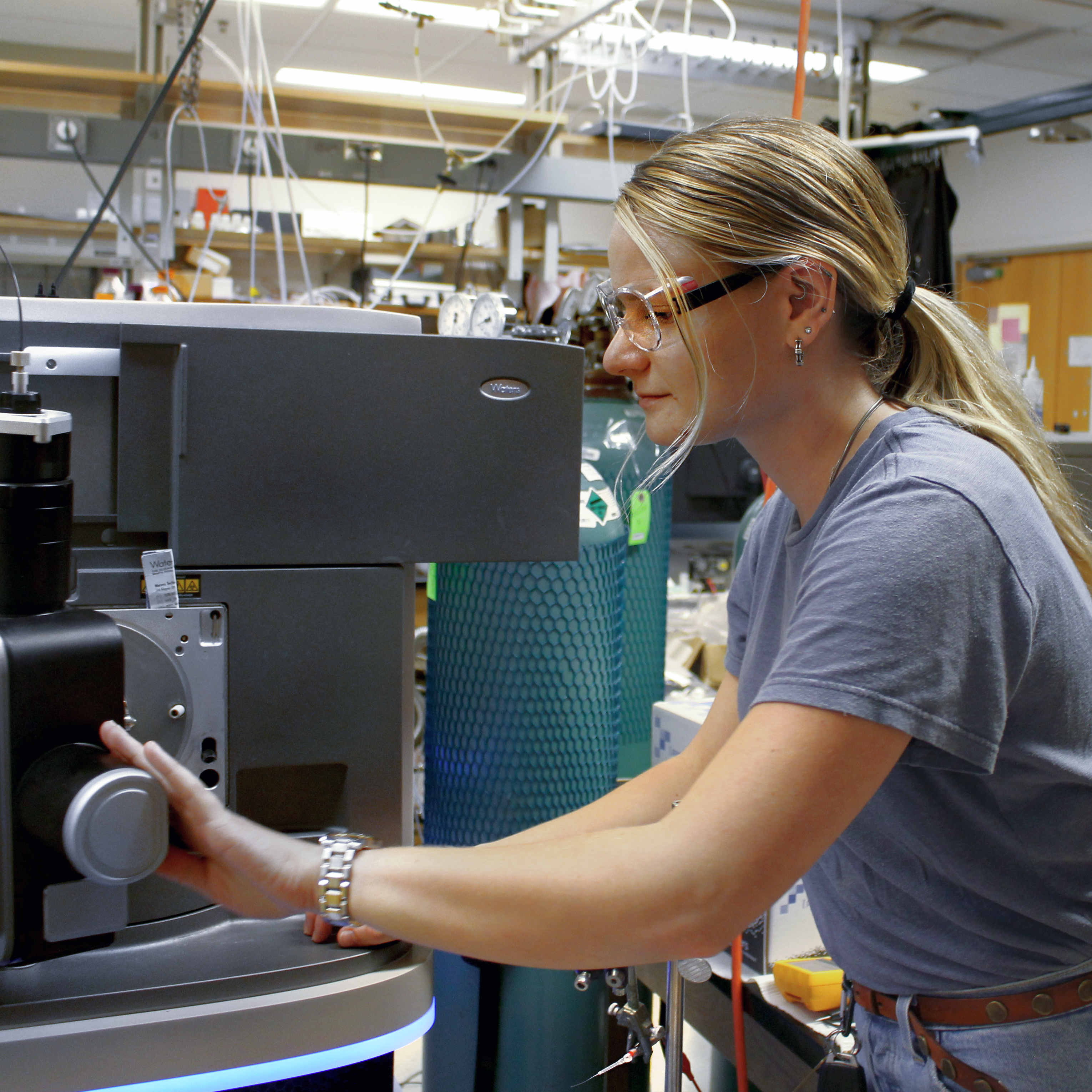 Person working at a fabrication machine